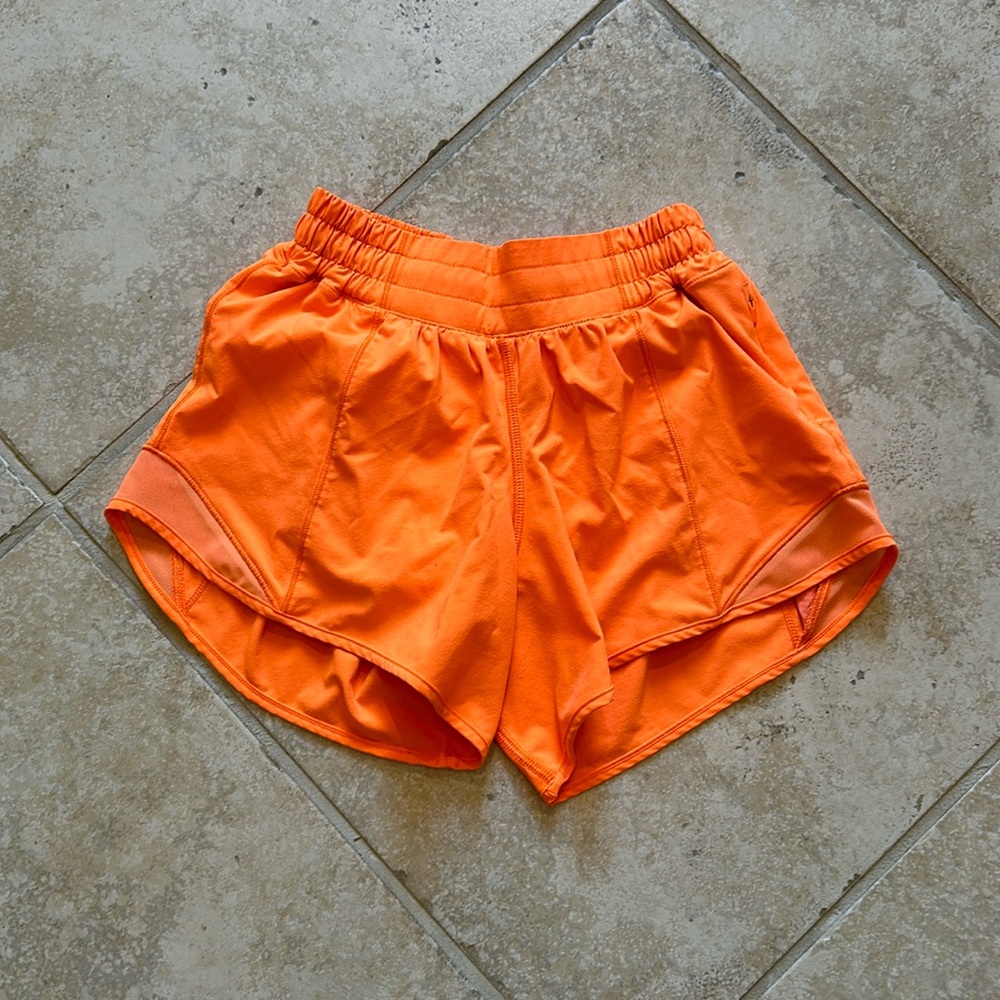 Size 2 hotty hot neon orange.  Good condition